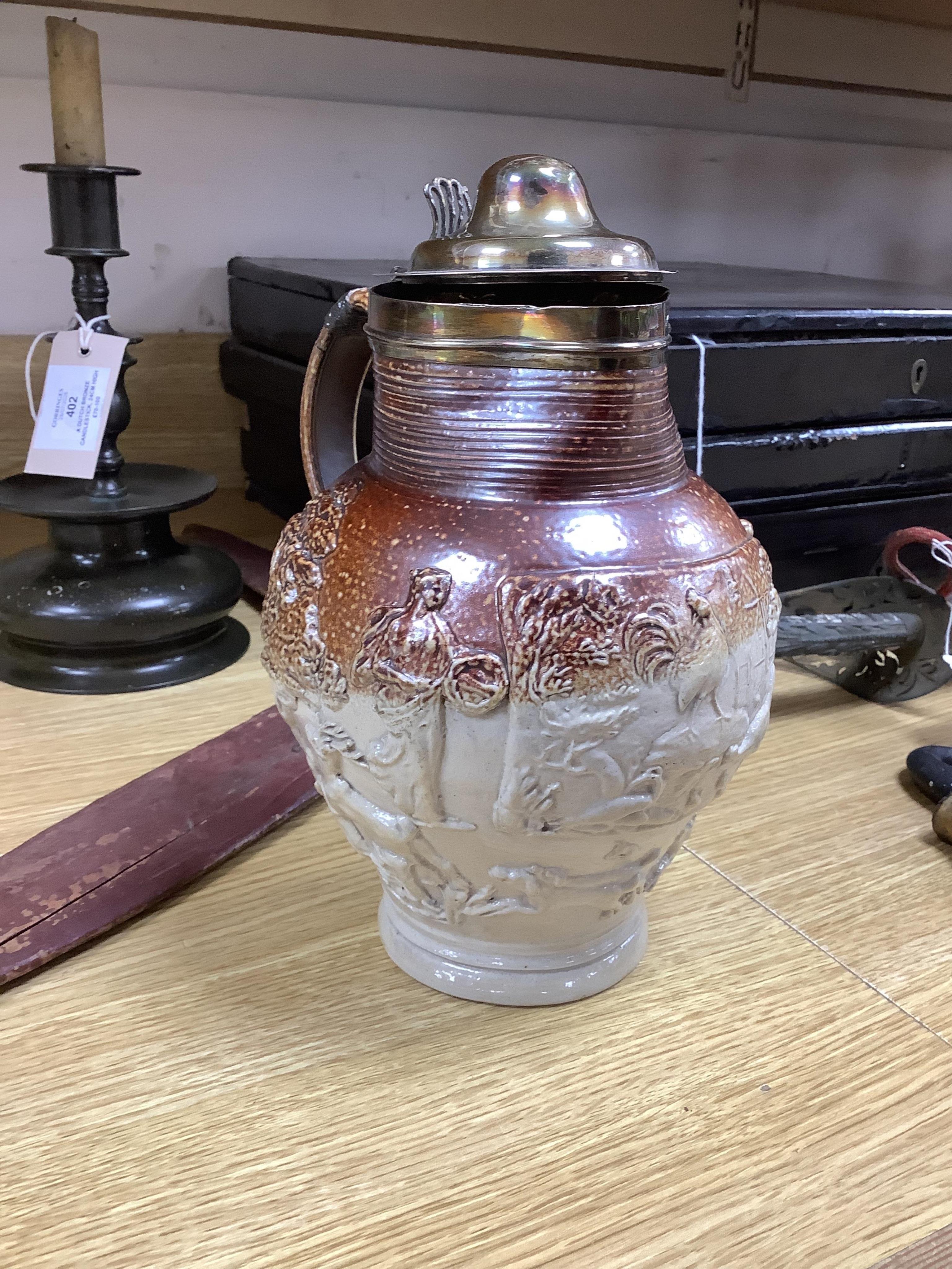 A group of Continental ceramics including two late 18th/early 19th century Italian maiolica wet drug jars, a Staffordshire Whieldon type tortoiseshell glazed plate c.1770 and a silver mounted Mortlake stoneware jug, 24cm
